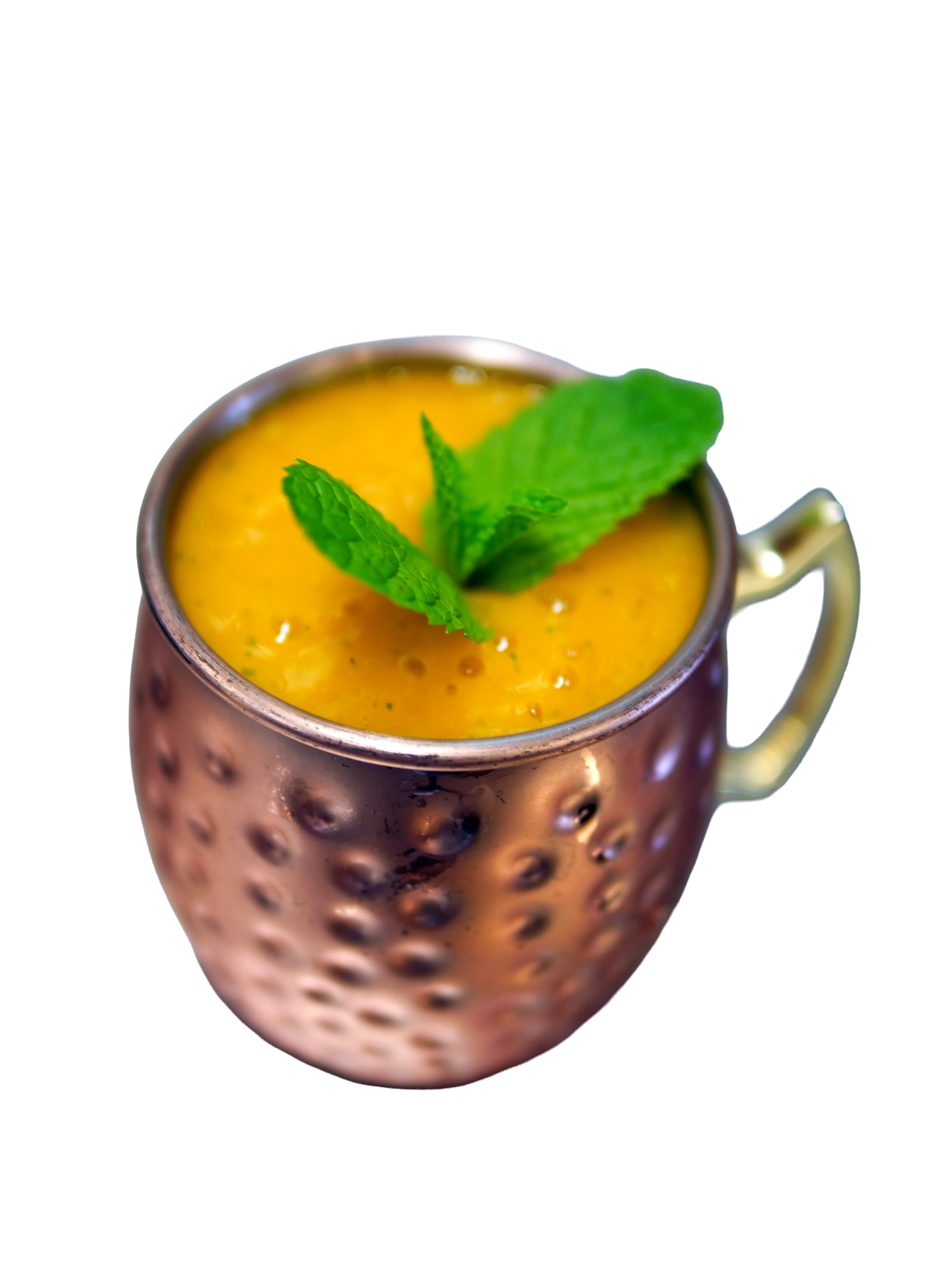 Virgin mango mojito drink in a tall glass with mint garnish
